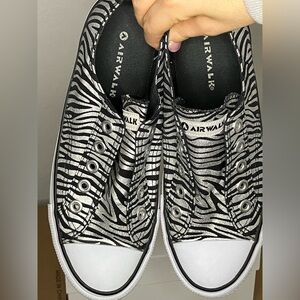 Airwalk size 7.5 black and silver zebra striped low top and laceless sneakers